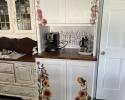 A cute coffee hutch we made for a client. Cabinet was made unfinished, and client painted and decorated. Holt Custom Cabinets does not do specialty finish work.