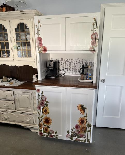 A cute coffee hutch we made for a client. Cabinet was made unfinished, and client painted and decorated. Holt Custom Cabinets does not do specialty finish work.